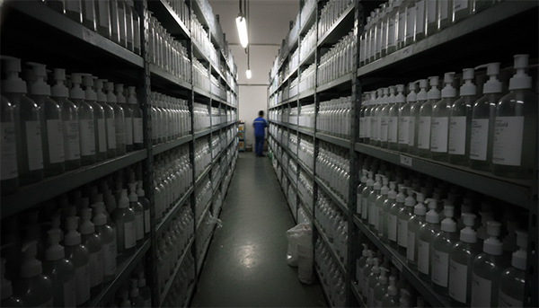 Warehouse shelves with generic bottles