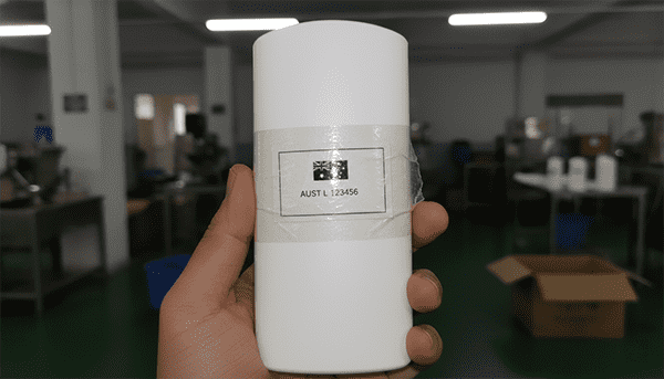 TGA AUST L Labeling Australian flag on sunscreen bottle