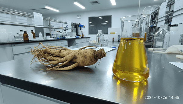 ginseng root next to chemistry flask