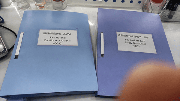 Side-by-side icons representing a Certificate of Analysis and a Safety Data Sheet.