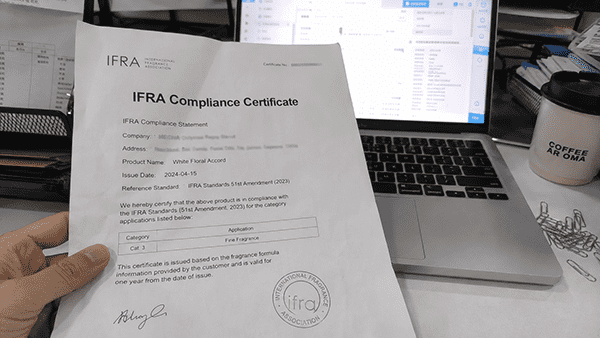 A person looking skeptically at an official-looking certificate.