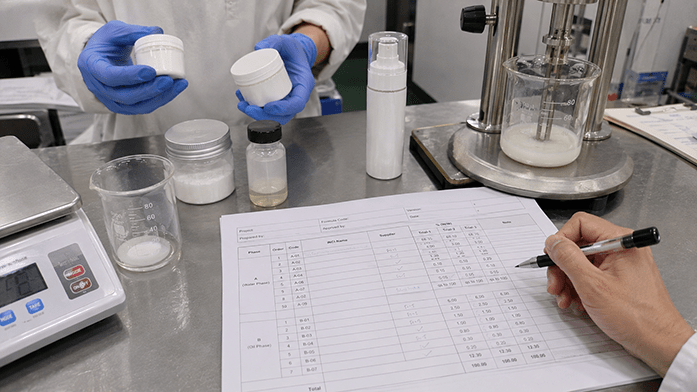 cosmetic formulation development services reviewing third party formula sheets