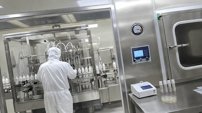 cleanroom filling line with sealed booth and HEPA supply diffuser, iPhone-angle snapshot